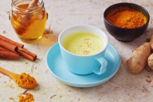 A cup of turmeric tea on the table